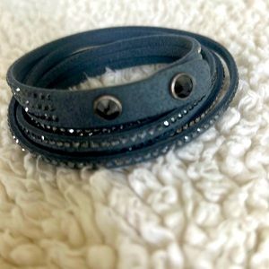 Touchstone Crystal by  Swarovski. Gray wrap around bracelet.  24” like new